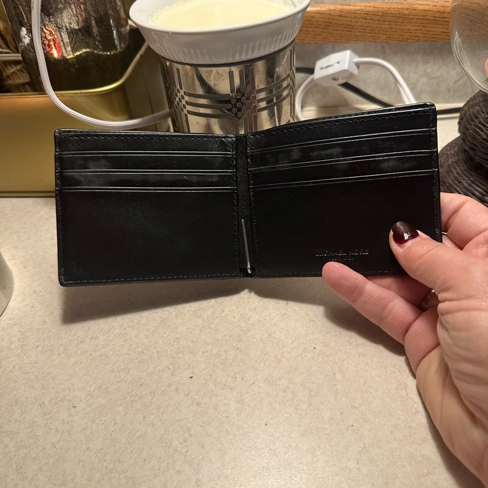 Michael Kors Cooper bilfold bifold wallet. Black and white. Used, mild wear
